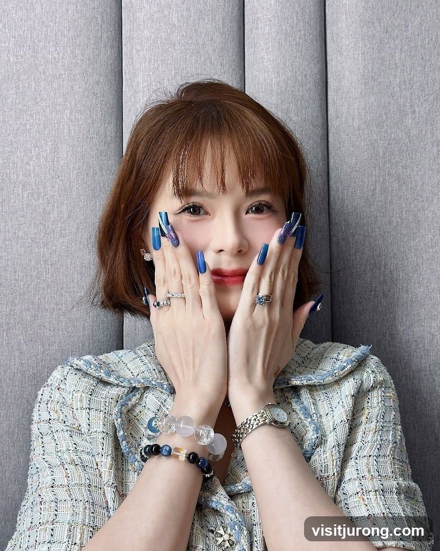 Woman with long blue nails