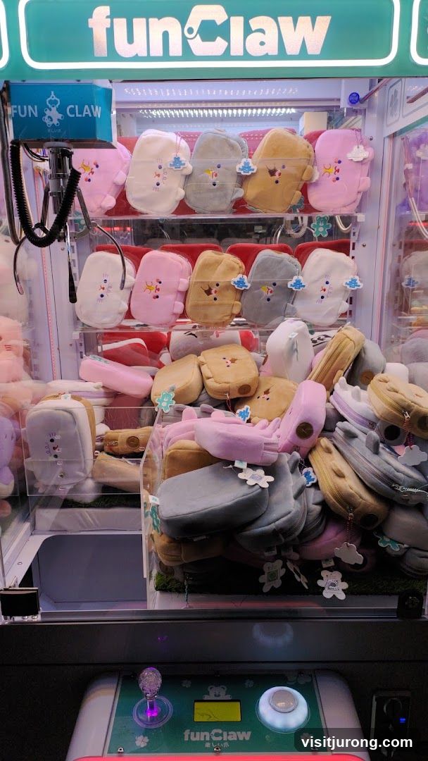 Claw Machine with Plush Pouches