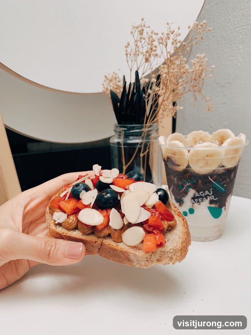 Toast with fruit and nuts and acai bowl