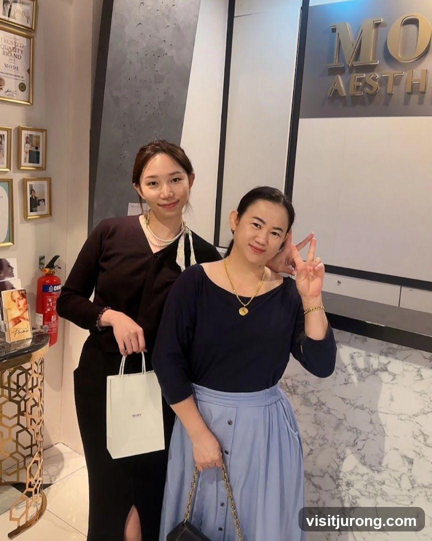 Two women posing inside a store