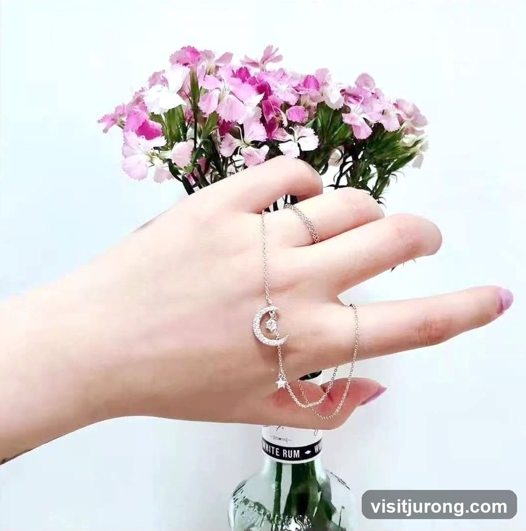 Hand with Moon and Star Necklace