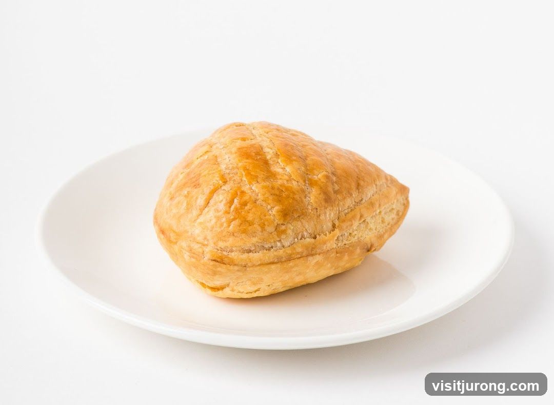 Golden Puff Pastry on a White Plate