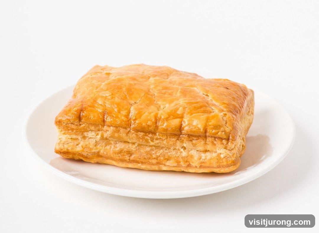 Golden Puff Pastry on a White Plate