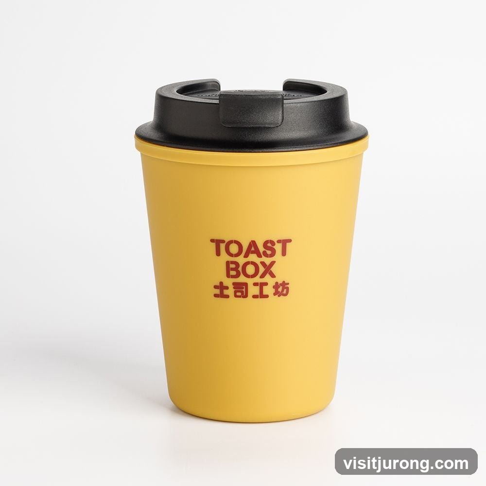 Yellow Travel Mug with "TOAST BOX" Logo