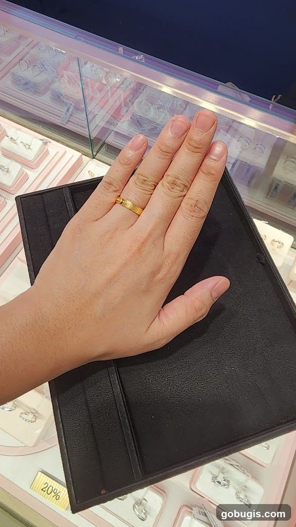 Hand with Ring in Jewelry Display