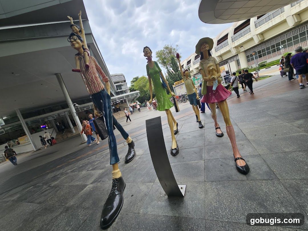 Sculptures of people walking