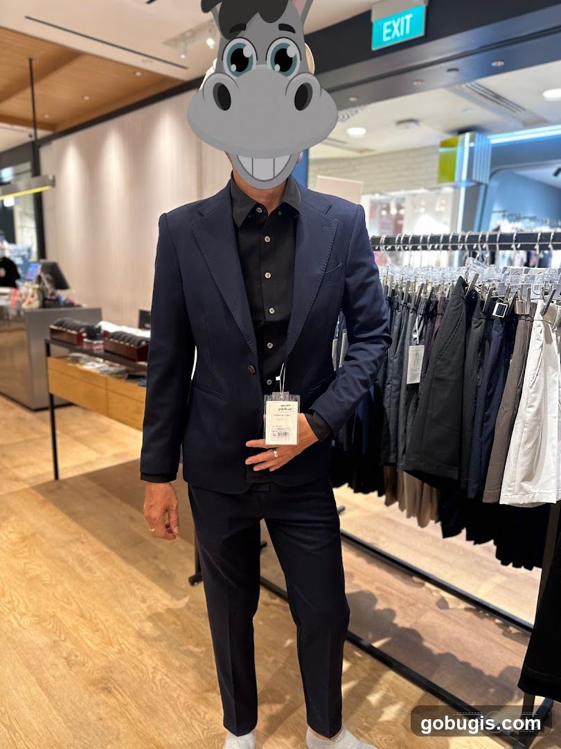Man in Suit in Clothing Store