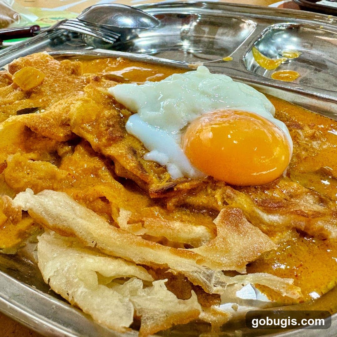 Roti Canai with Egg and Curry