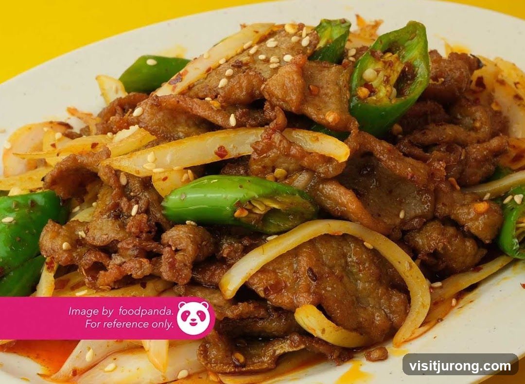 Spicy Stir-Fried Beef with Peppers and Onions