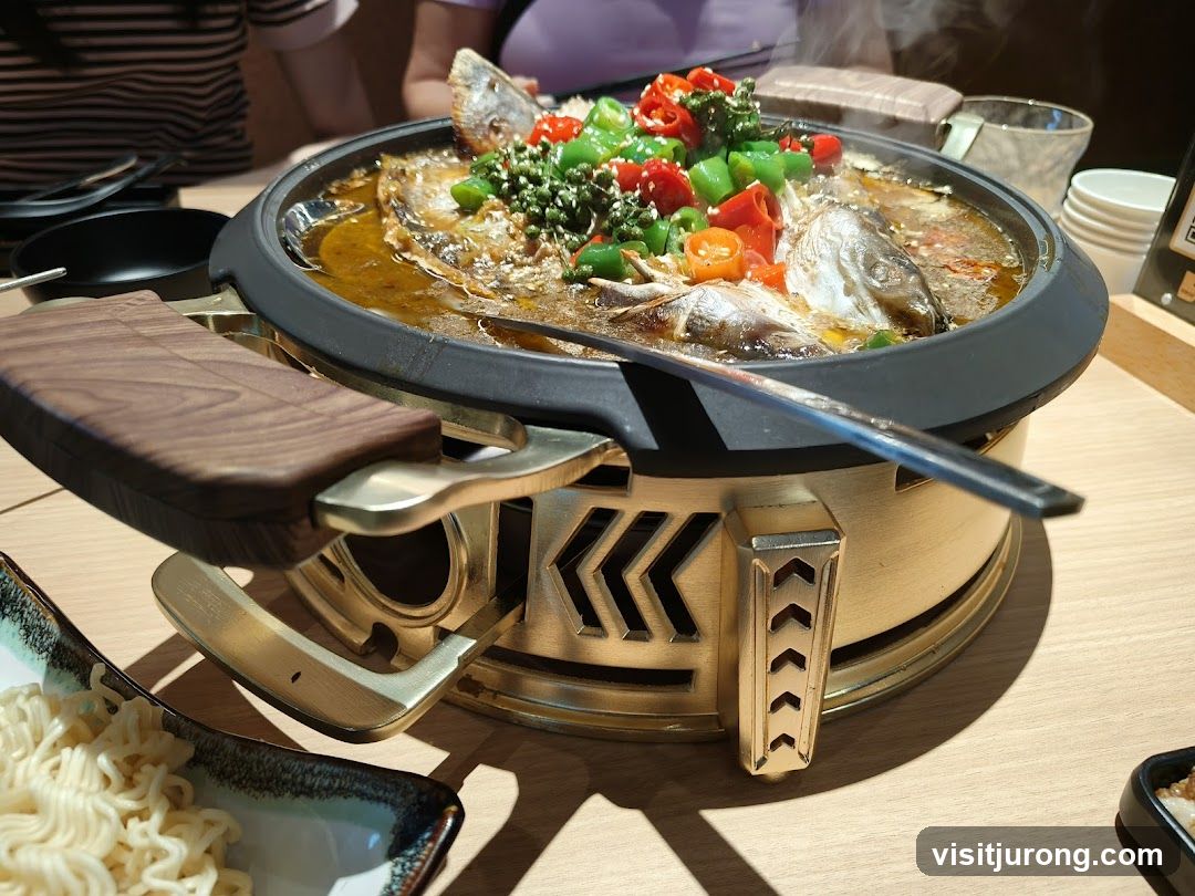 Steaming Fish Dish with Noodles