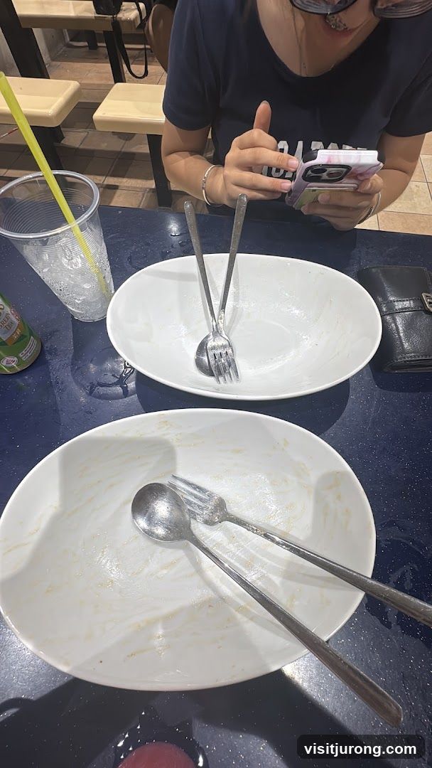 Dirty Dishes and Person on Phone