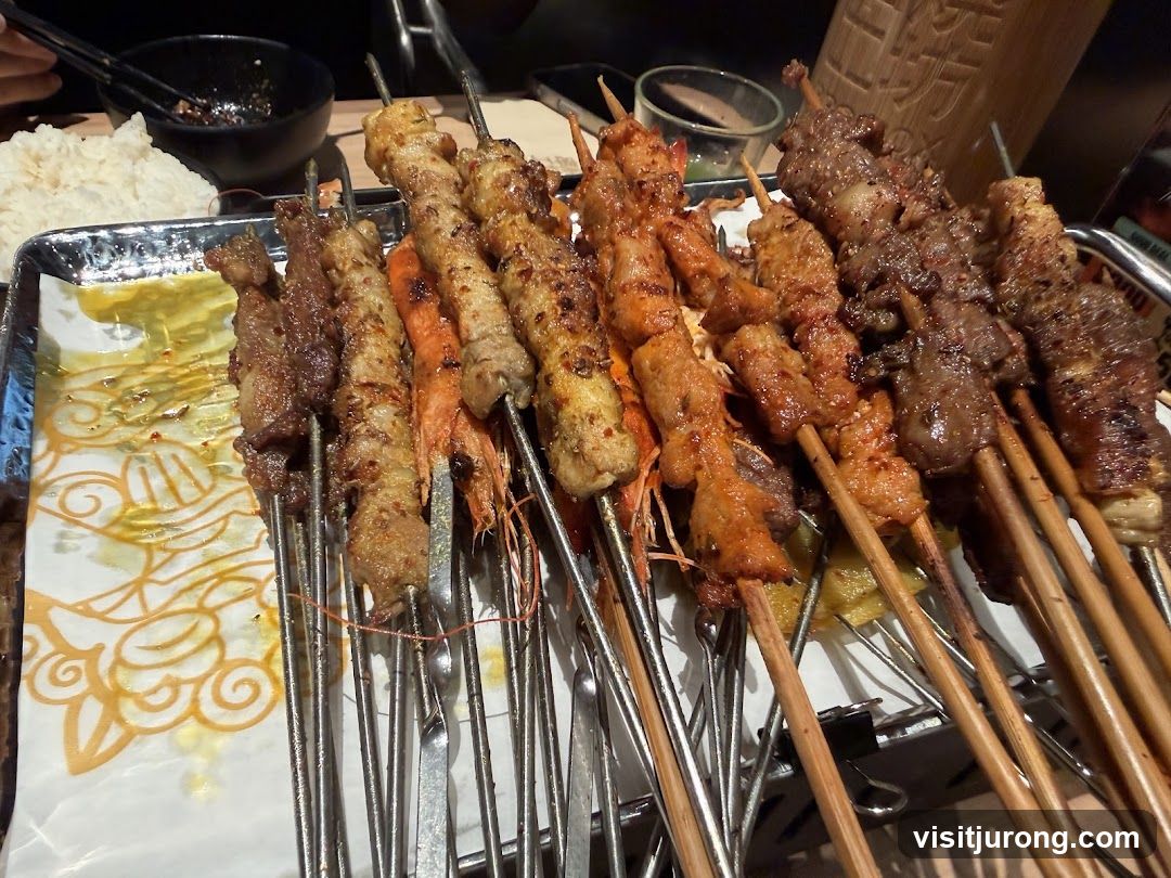 Skewers of grilled meat and shrimp