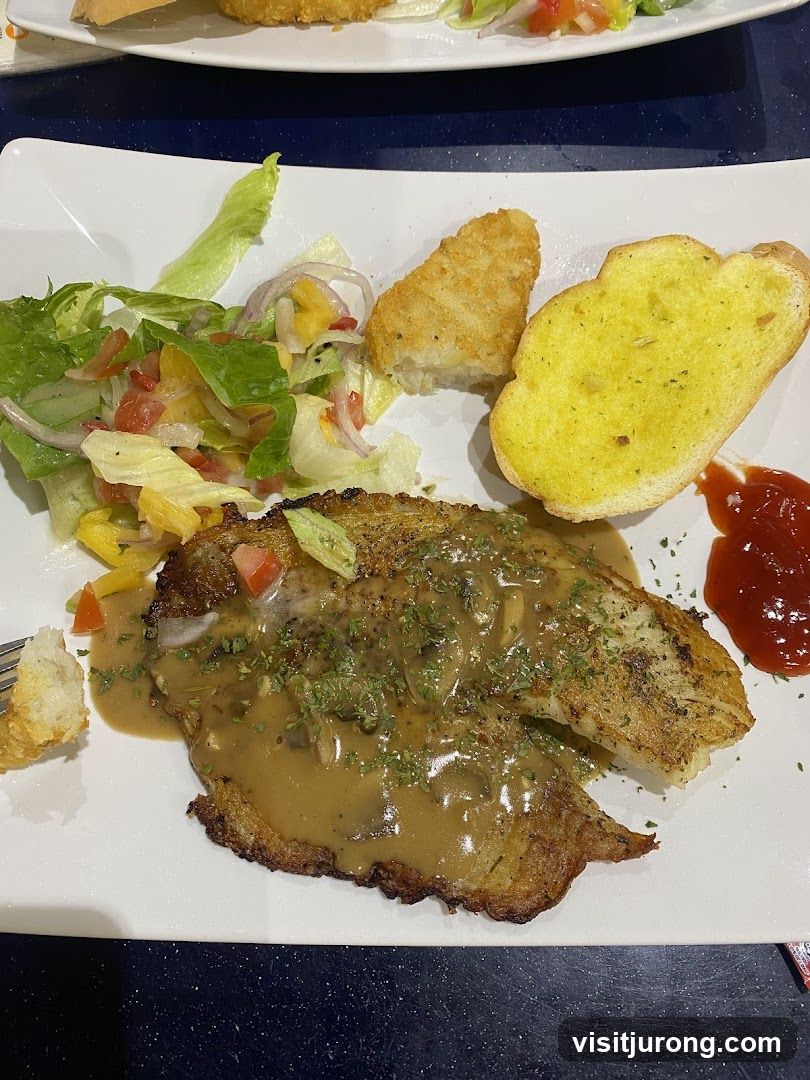 Fish Fillet with Salad and Garlic Bread