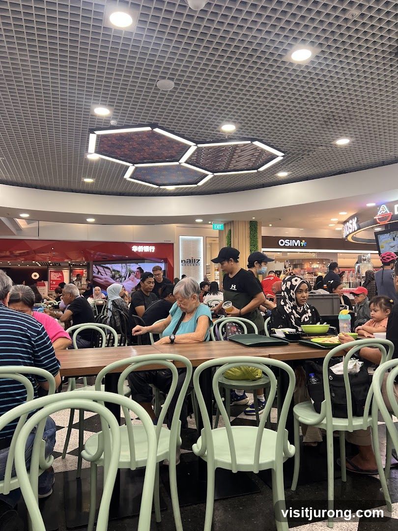 People dining in a food court
