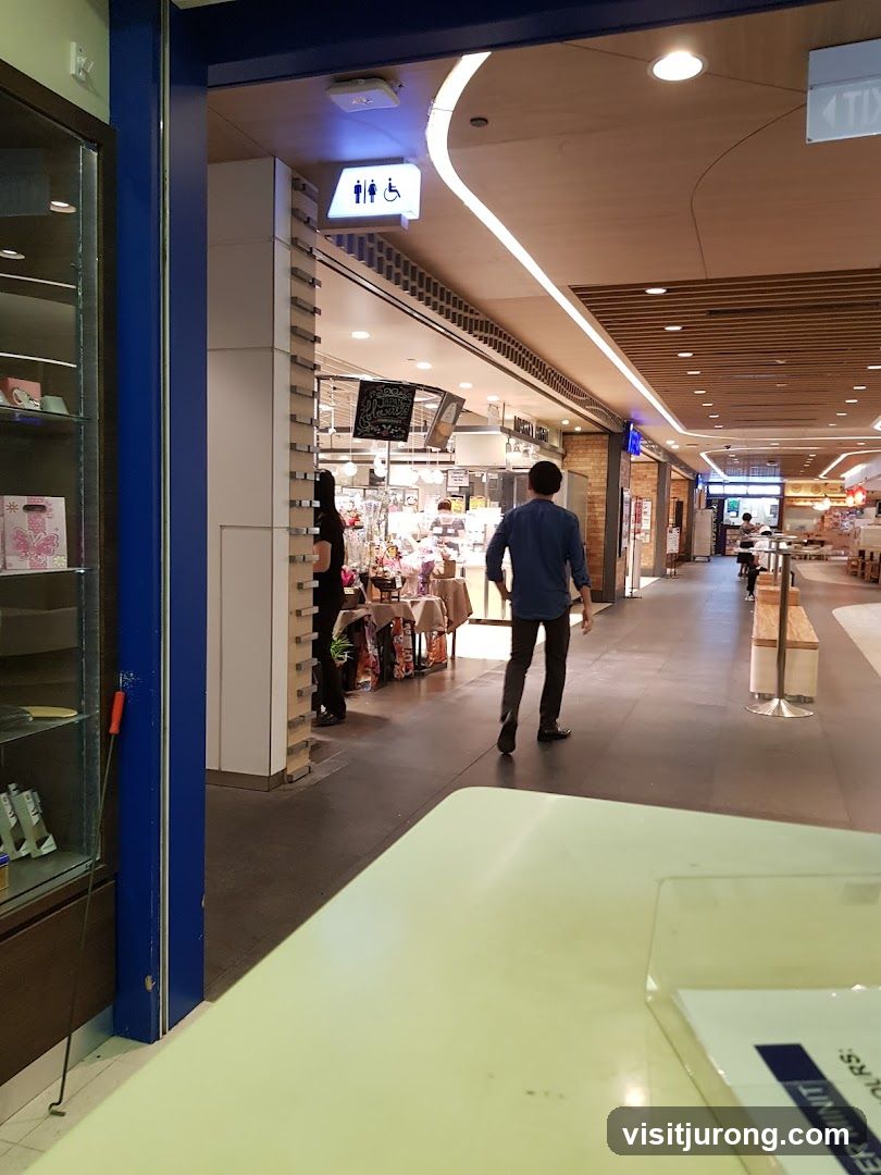 Mall Interior with Restroom Signage