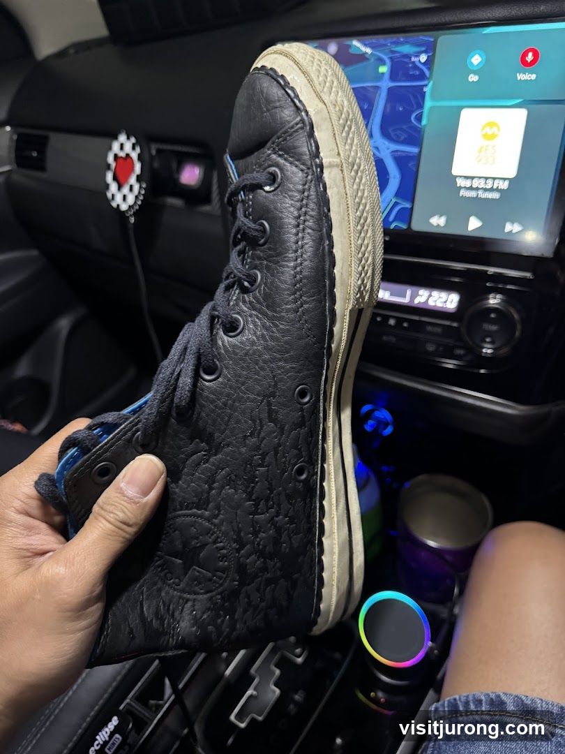 Black Converse Sneaker in Car