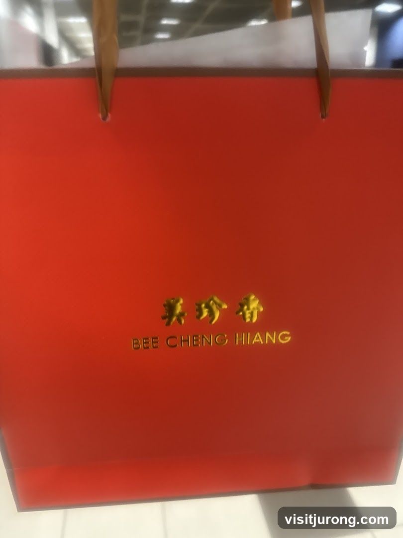 Red Shopping Bag with Gold Logo