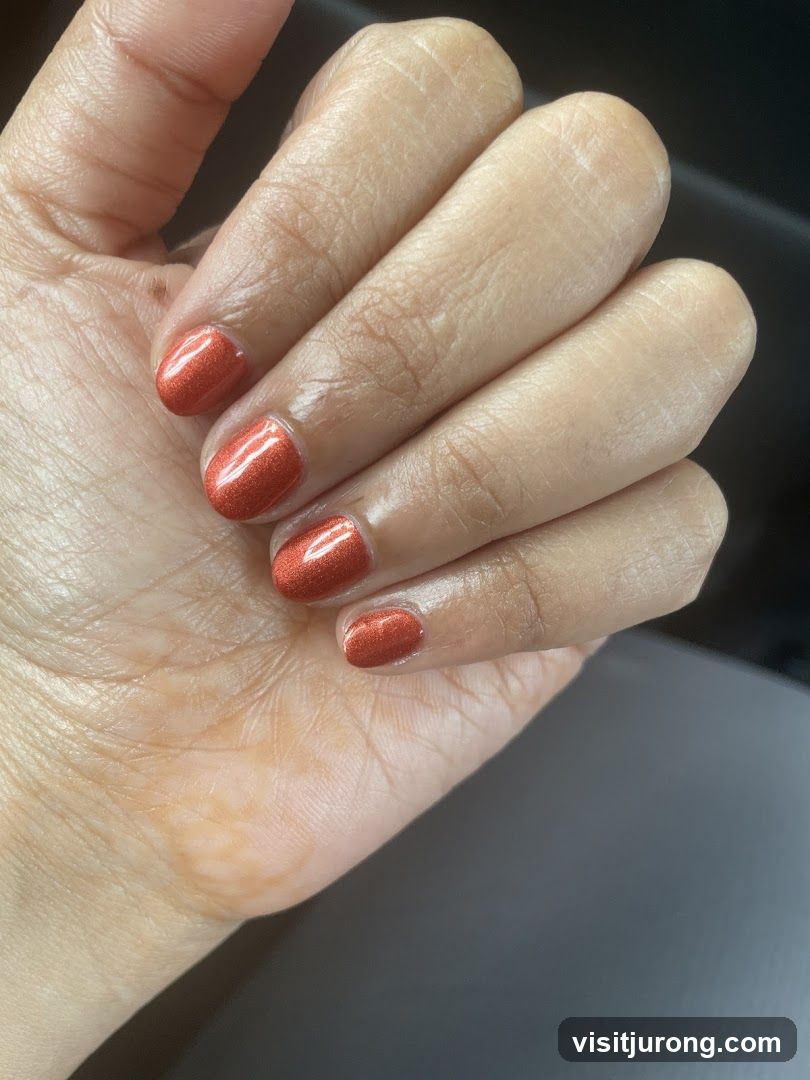 Orange Sparkle Nails