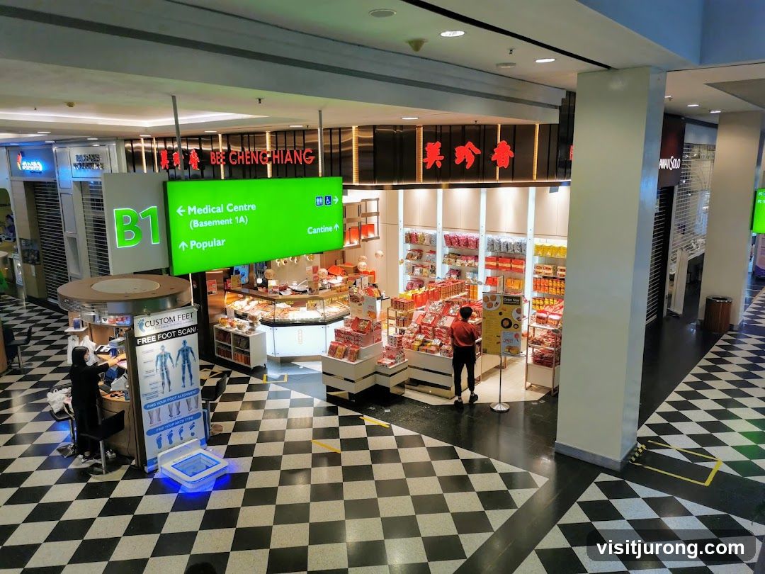 Mall Interior with Food Store and Signage