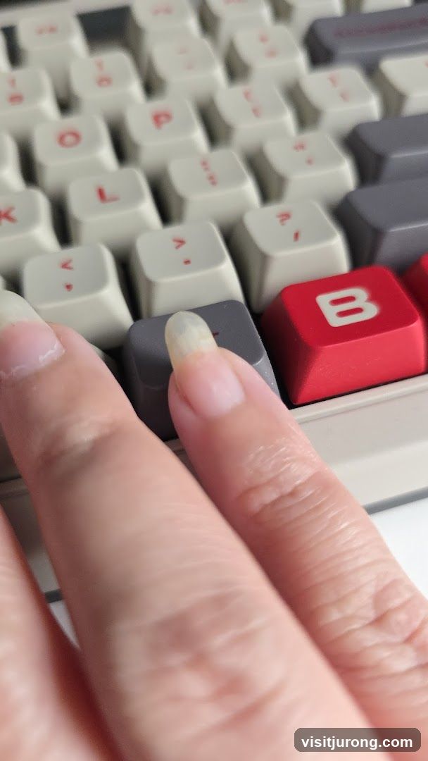 Close-up of a hand on a keyboard