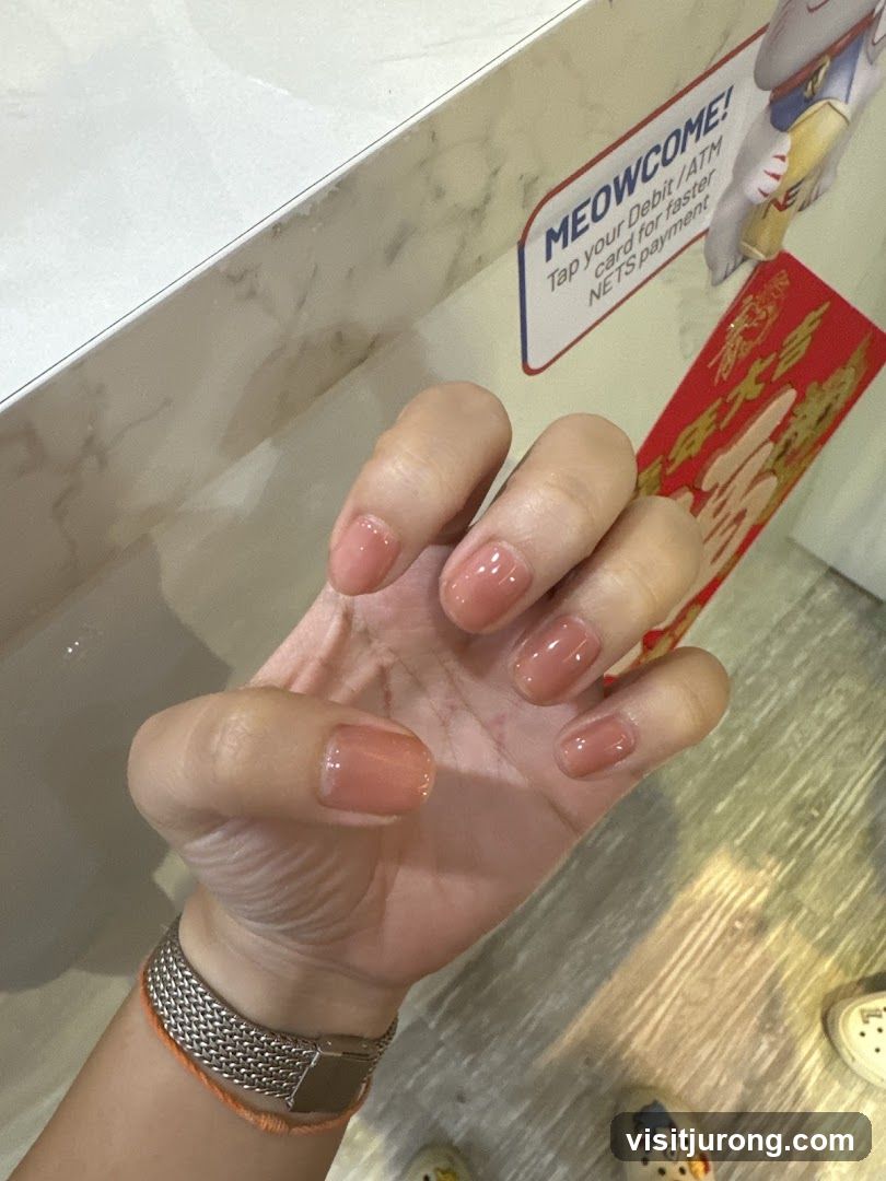 Manicured Hand with Payment Sign