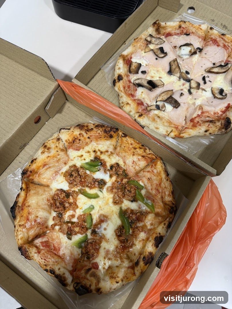 Two Pizzas in Boxes