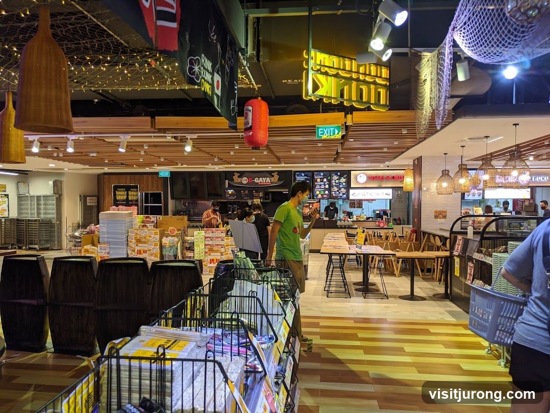 Indoor market with food stalls and merchandise