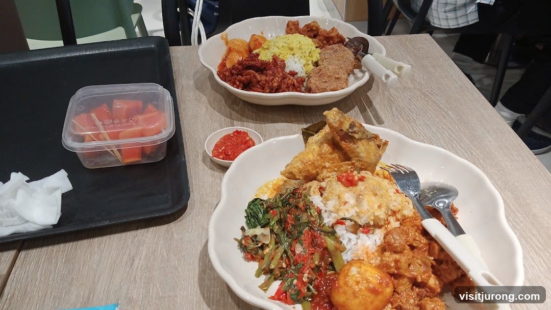 Two plates of Indonesian food