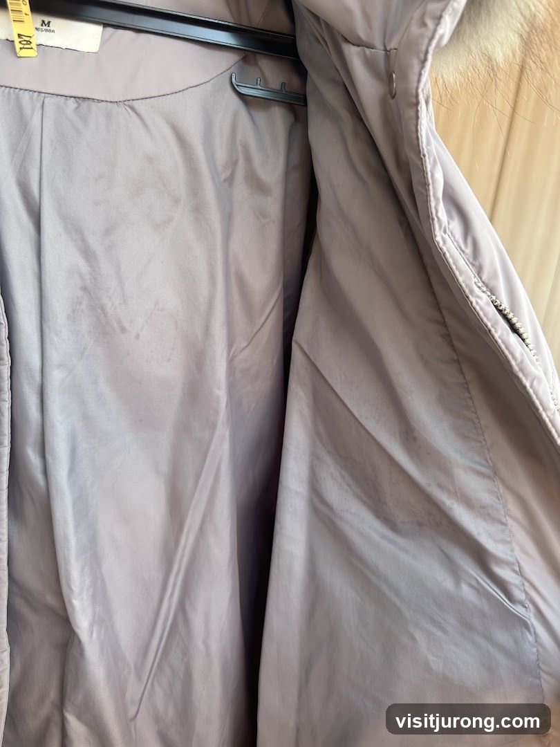 Inside of a light purple jacket
