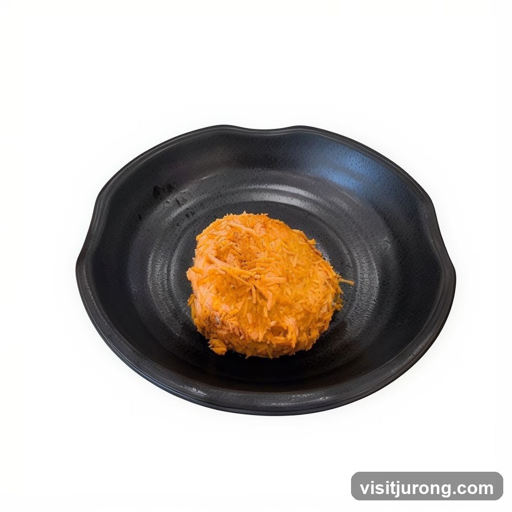 Croquette on a black plate
