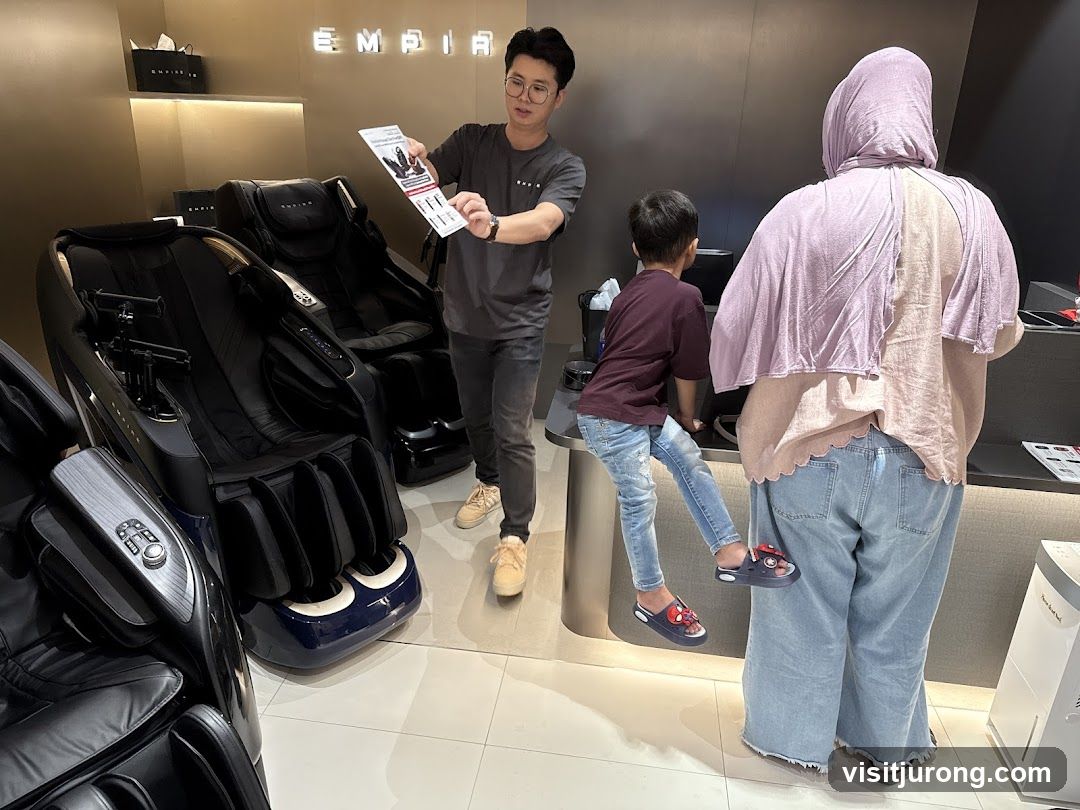 Salesperson Demonstrating Massage Chairs