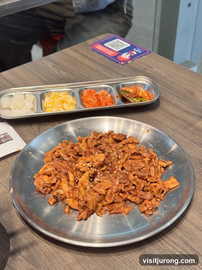 Spicy Stir-Fried Dish with Side Dishes