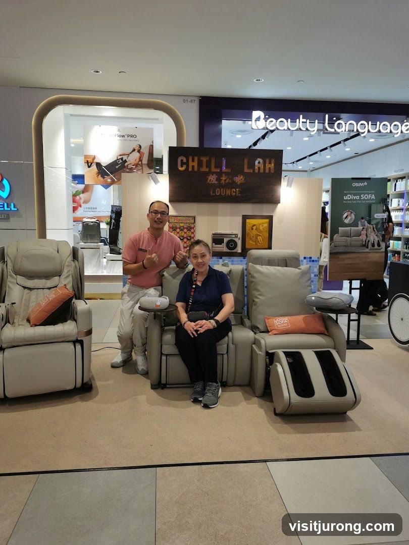 People posing with massage chairs