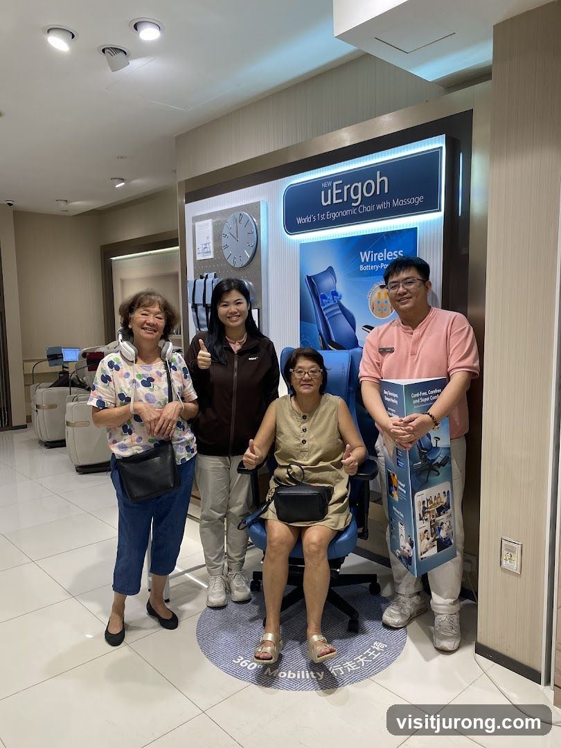 People posing with an ergonomic chair