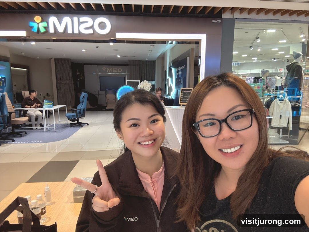 Two Women Posing in Front of a MISO Store