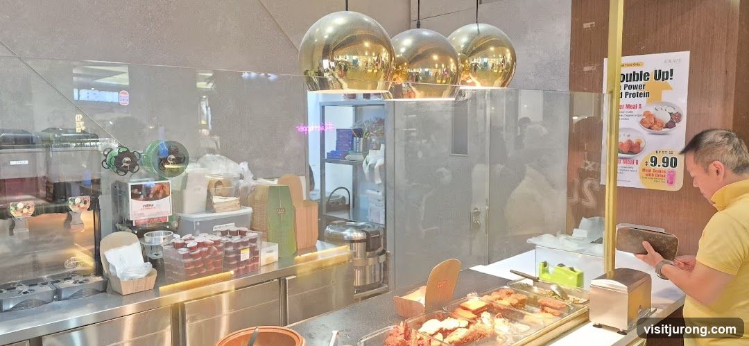 Food Counter with Promotional Poster