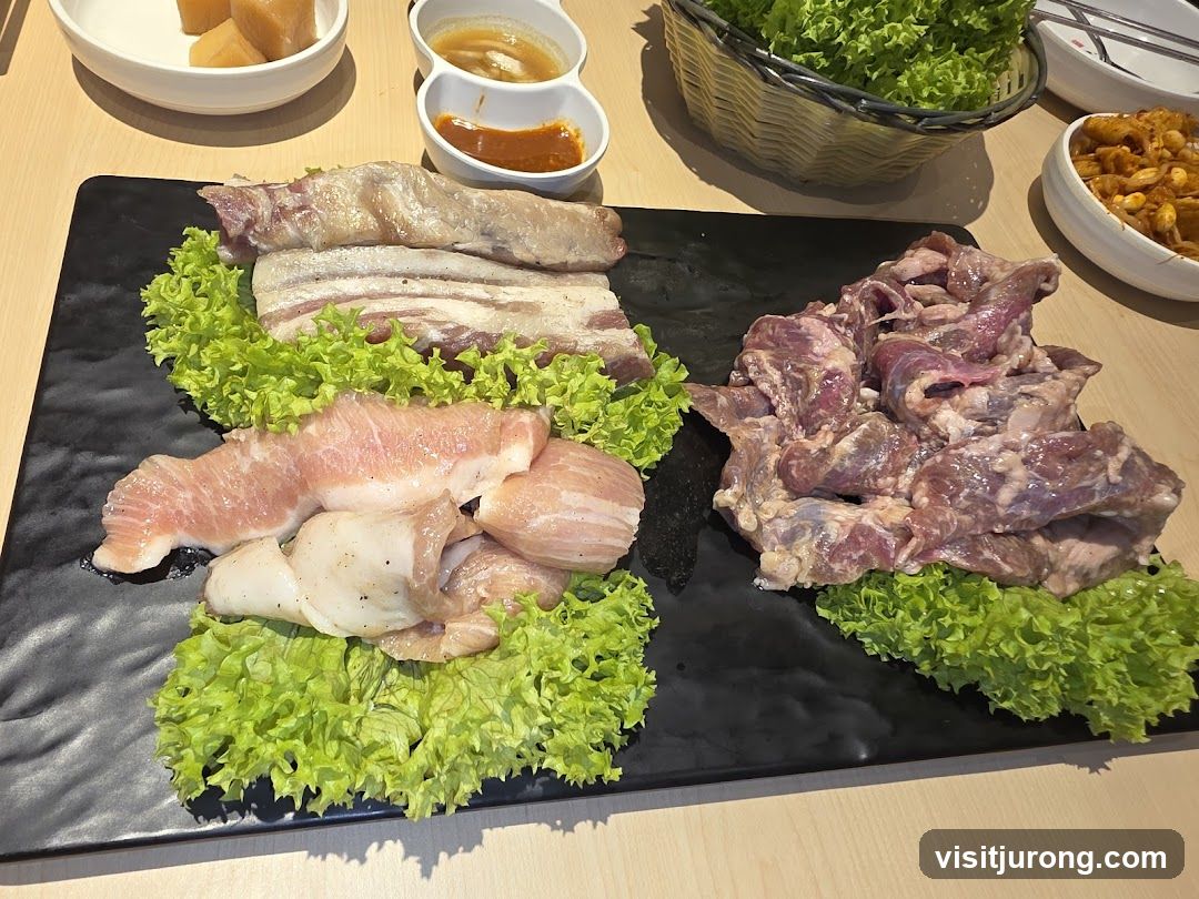 Assortment of Raw Meats and Lettuce