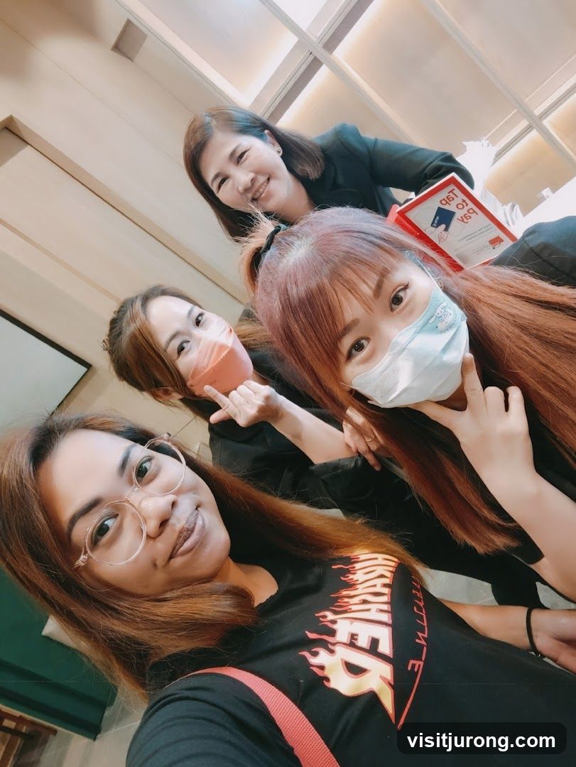 Four women posing for a selfie