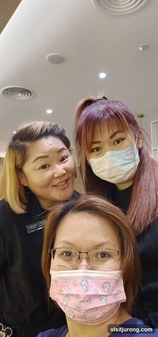 Three women wearing masks