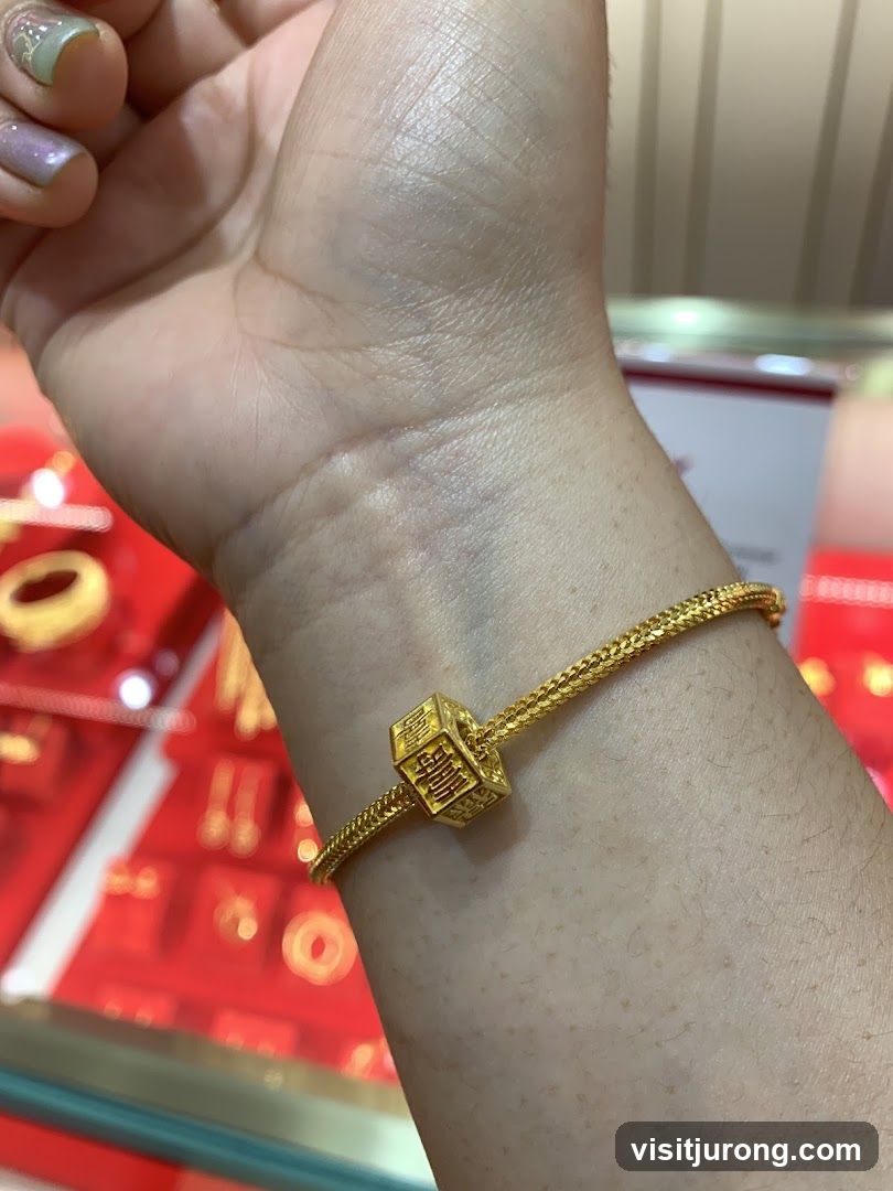Gold Bracelet with Charm