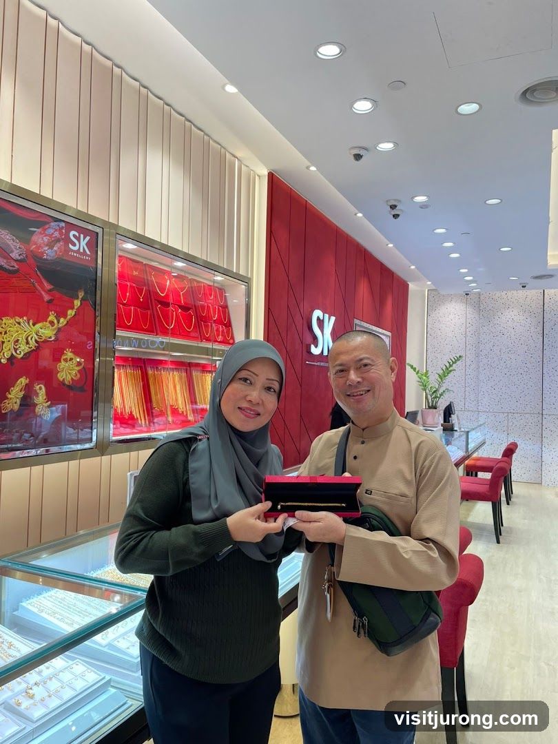 Couple holding a jewelry box in a store
