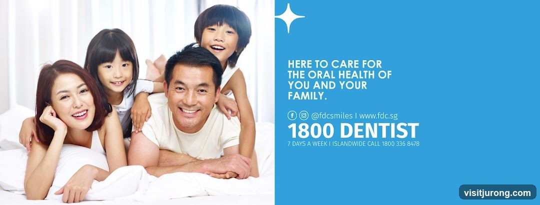 Family smiling on a bed
