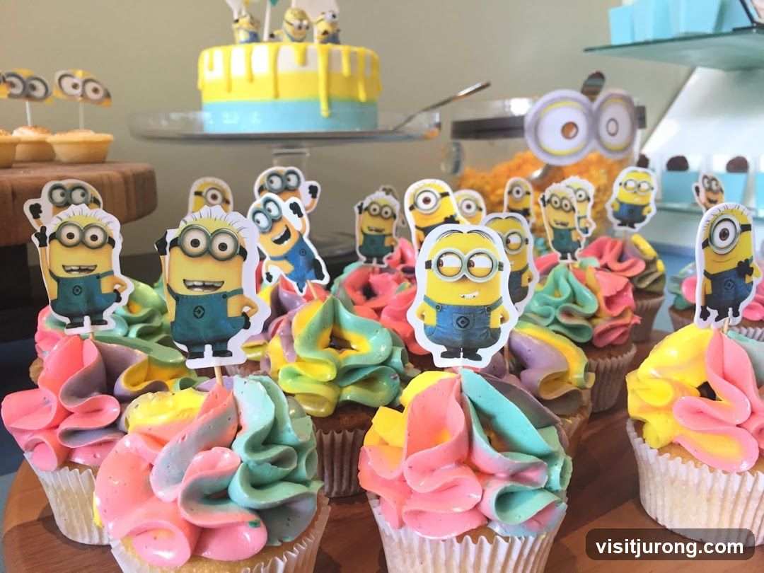 Minion-themed cupcakes and cake