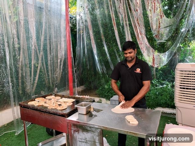 Man preparing flatbreads
