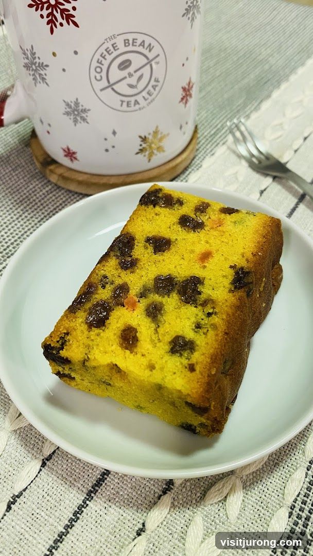 Slice of Fruitcake with Coffee Mug