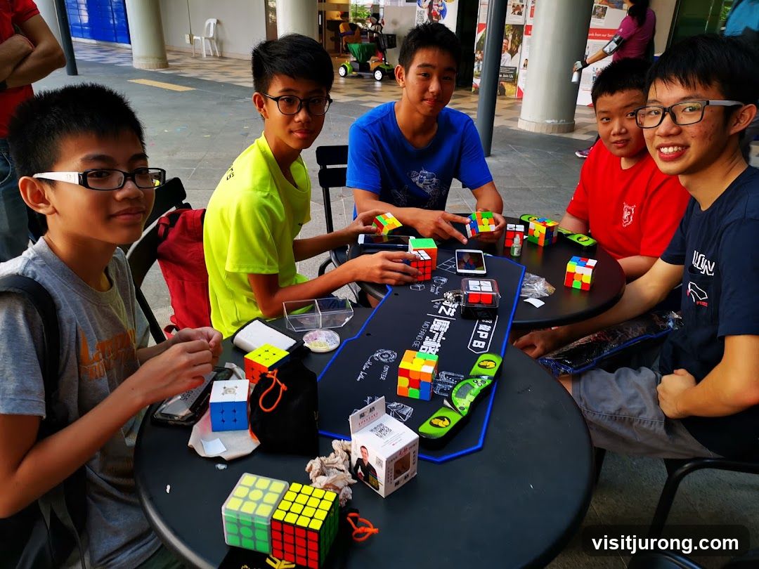 Boys playing with Rubik's cubes