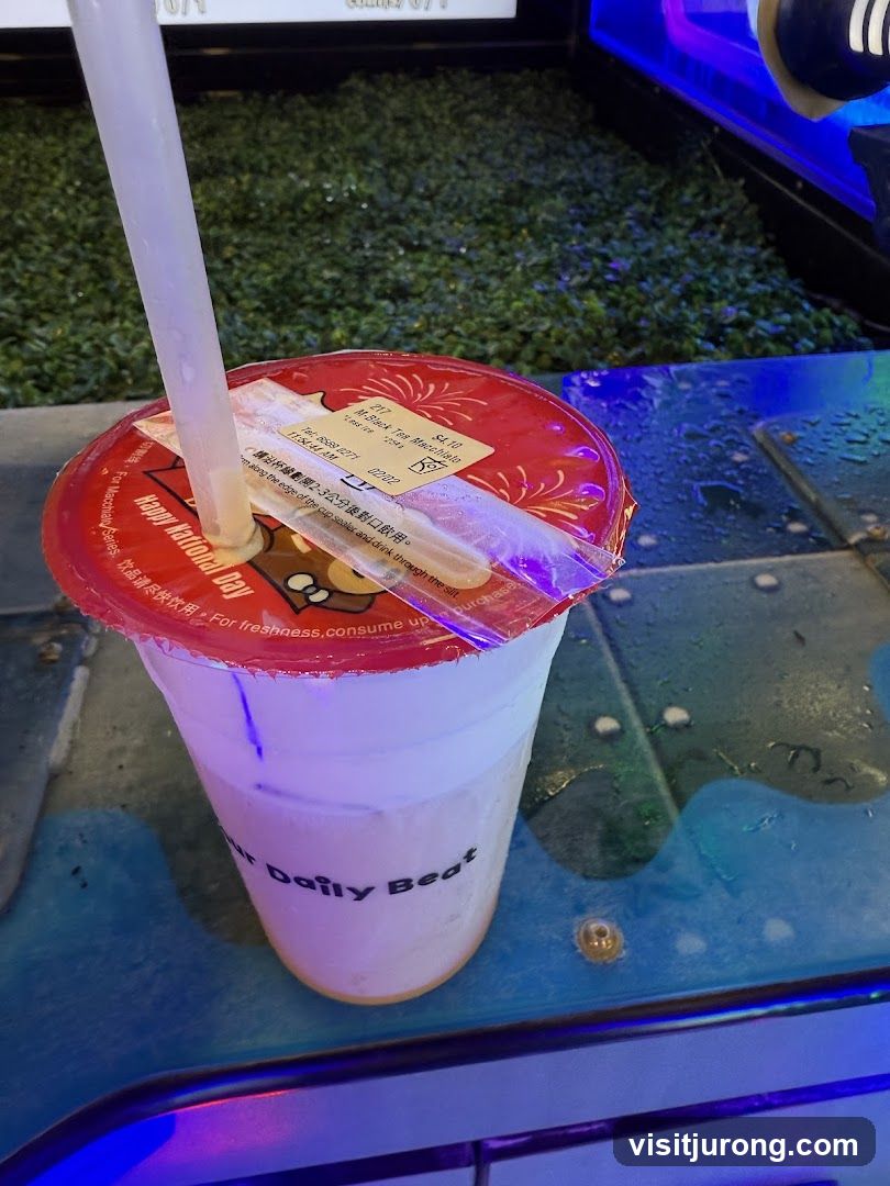 Beverage with Lid and Straw
