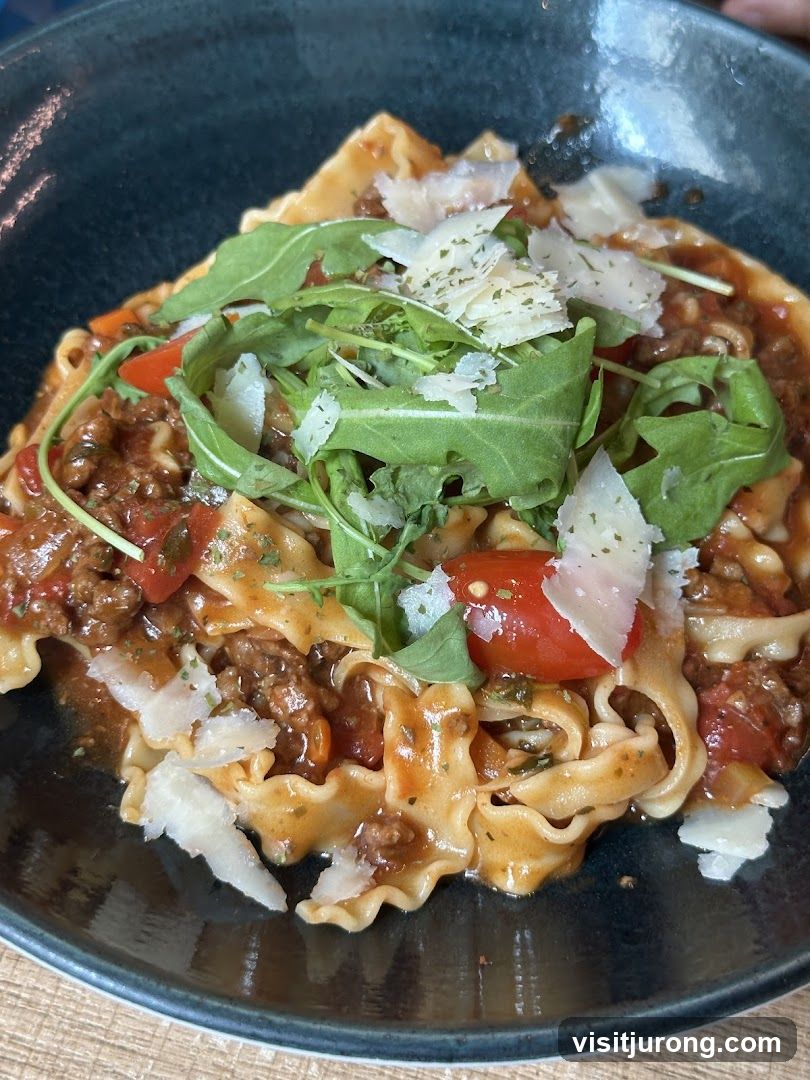 Pasta with Meat Sauce and Arugula