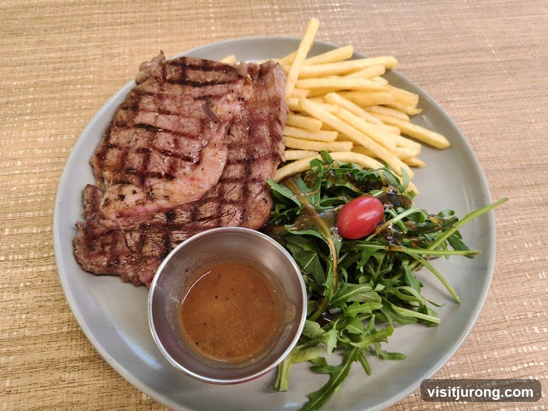 Steak with fries and salad
