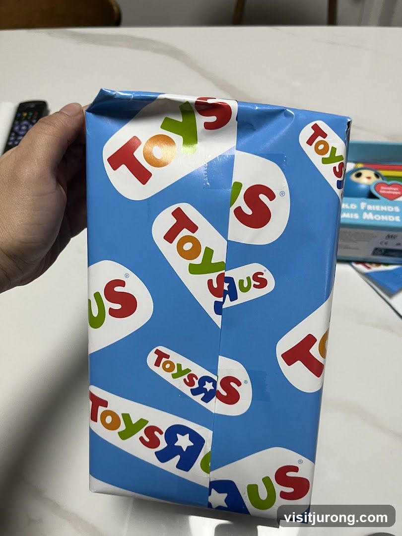 Gift-wrapped box with Toys R Us logo